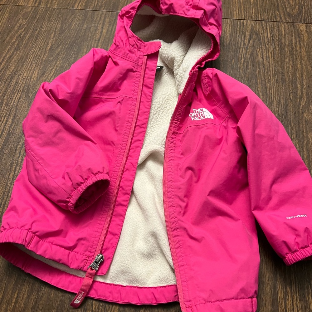Size 18-24 month Pink Northface winderbreaker/rain jacket.  Fleece lined.